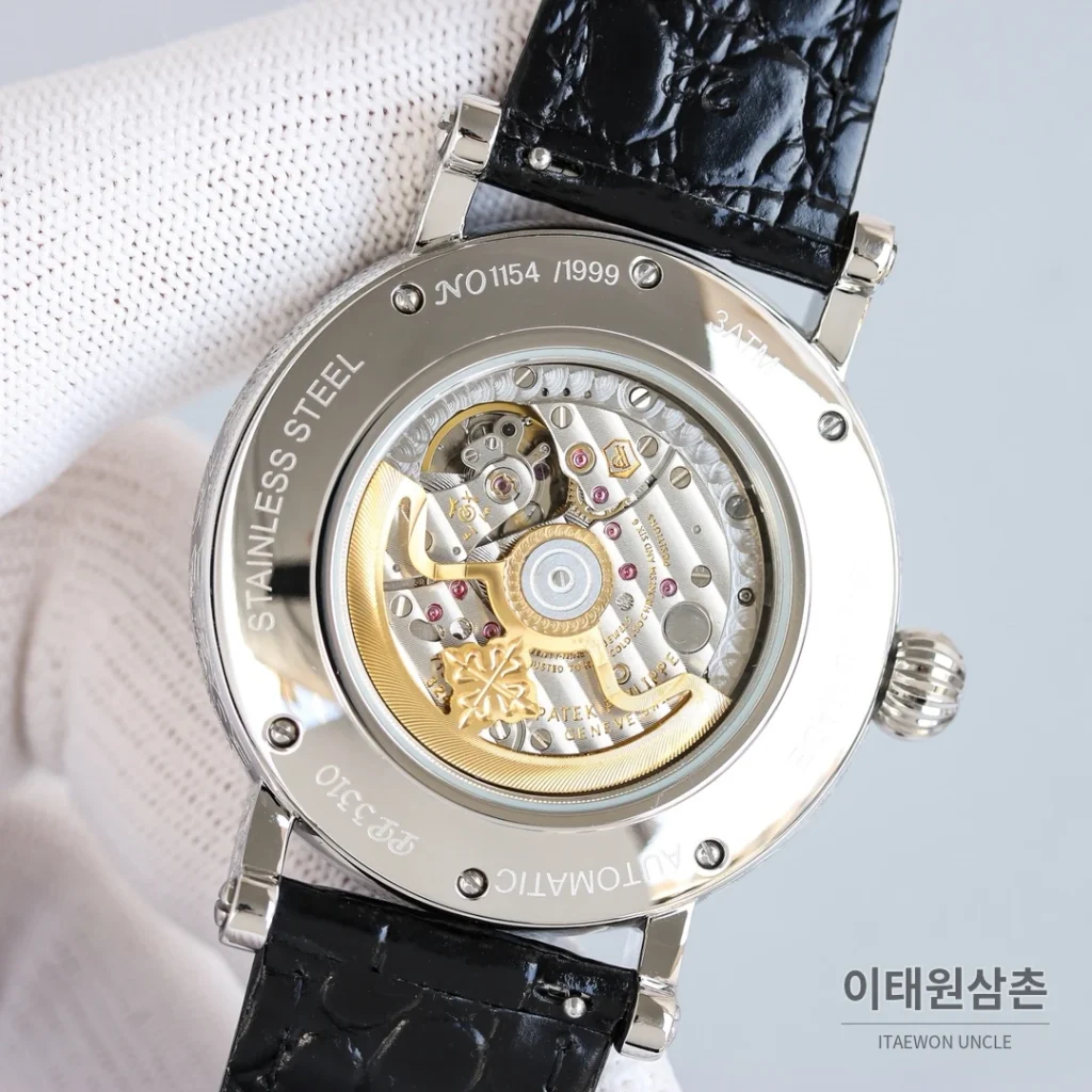 파텍필립 칼라트라바 스틸 퍼페추얼캘린더 문페이즈 오토매틱 42mm 화이트 다이얼 브라운 가죽 스트랩 로즈골드 베젤
