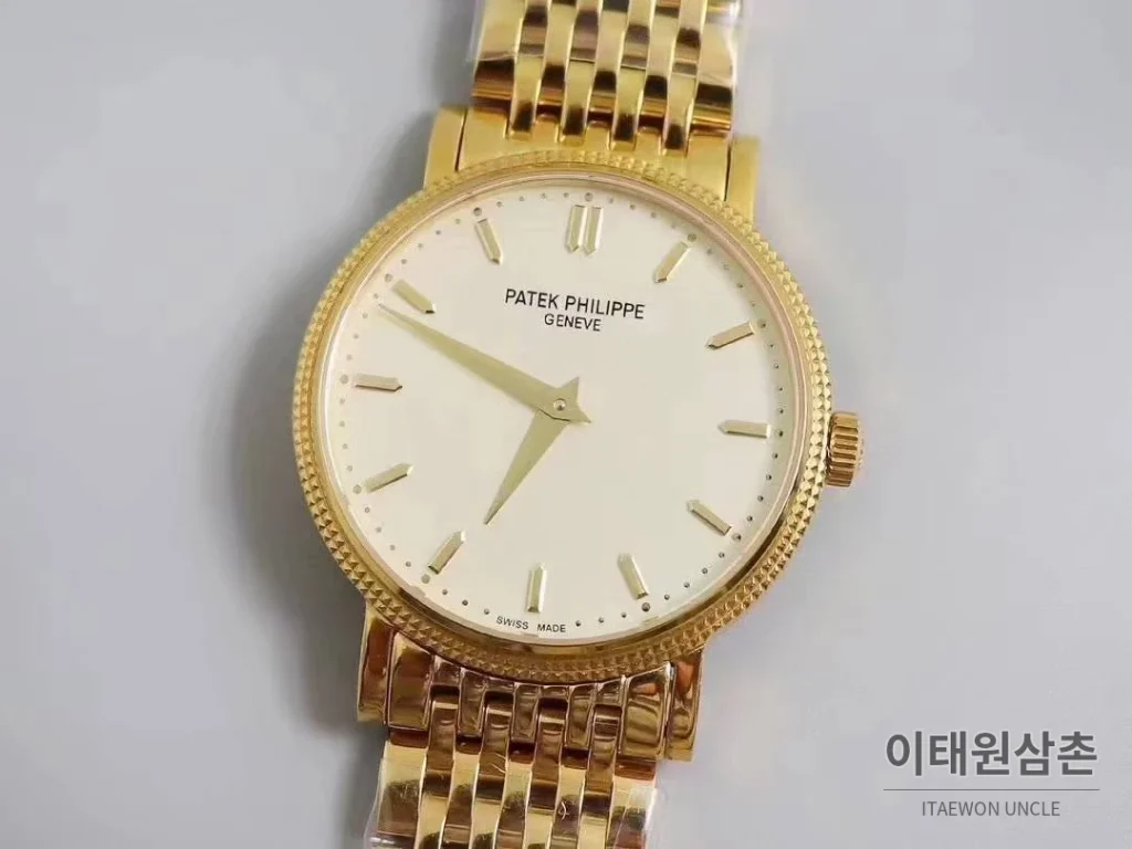 파텍필립 칼라트라바 화이트다이얼 로만인덱스 울트라씬 오토매틱 38mm 골드 브레이슬릿 골드 베젤