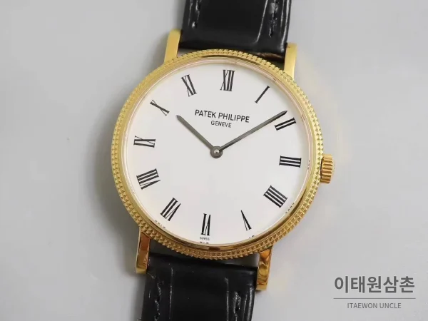 파텍필립 칼라트라바 화이트다이얼 로만인덱스 울트라씬 오토매틱 38mm 블랙 가죽 스트랩 골드 베젤