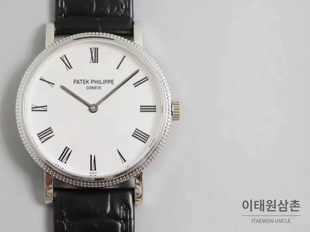 파텍필립 칼라트라바 화이트다이얼 로만인덱스 울트라씬 오토매틱 38mm 블랙 가죽 스트랩 실버 베젤