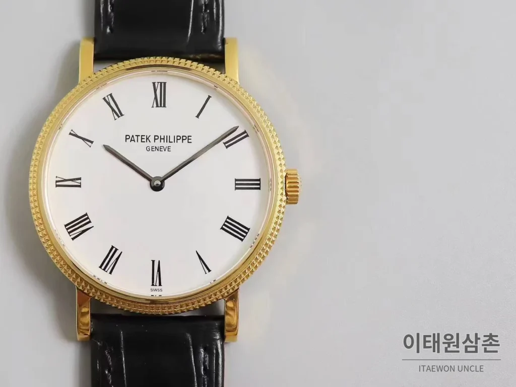 파텍필립 칼라트라바 화이트다이얼 로만인덱스 울트라씬 오토매틱 38mm 블랙 가죽 스트랩 골드 베젤
