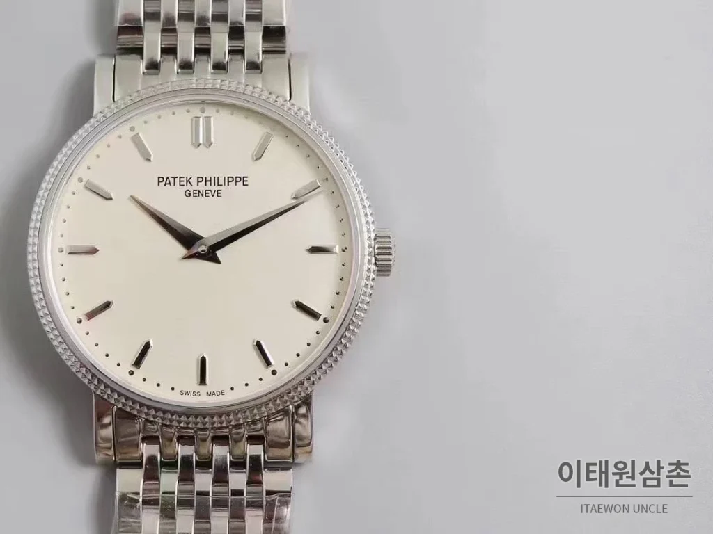 파텍필립 칼라트라바 화이트다이얼 로만인덱스 울트라씬 오토매틱 38mm 스틸 브레이슬릿