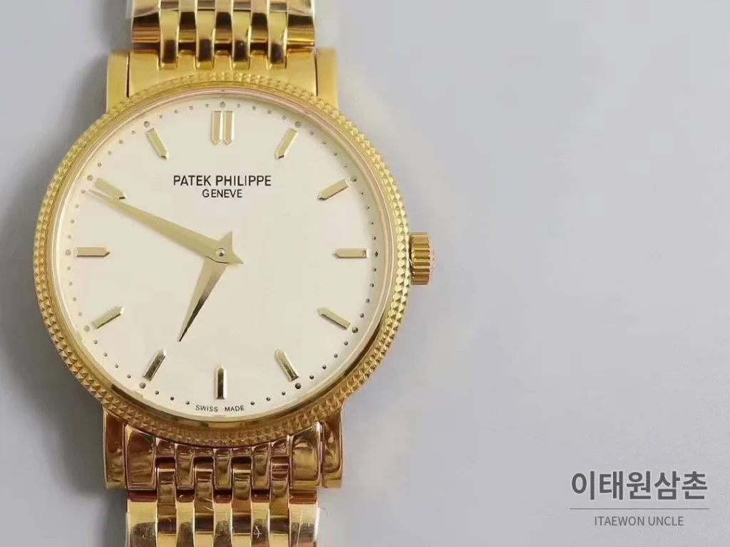 파텍필립 칼라트라바 화이트다이얼 로만인덱스 울트라씬 오토매틱 38mm 골드 브레이슬릿 골드 베젤