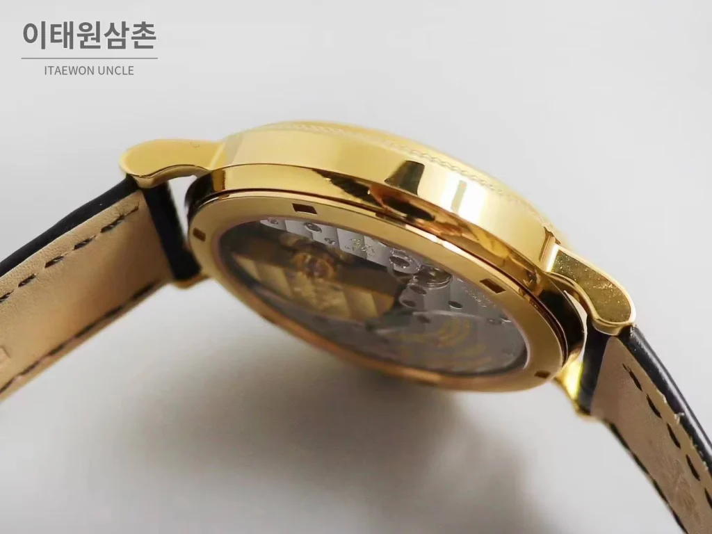 파텍필립 칼라트라바 화이트다이얼 로만인덱스 울트라씬 오토매틱 38mm 블랙 가죽 스트랩 골드 베젤