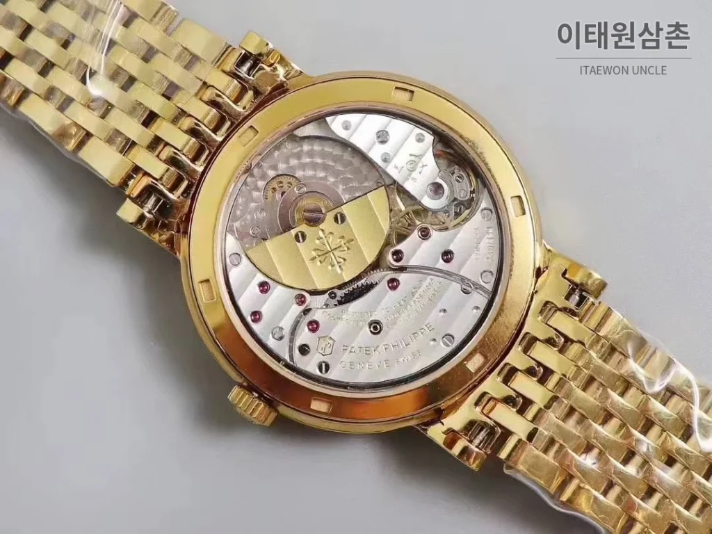 파텍필립 칼라트라바 화이트다이얼 로만인덱스 울트라씬 오토매틱 38mm 골드 브레이슬릿 골드 베젤