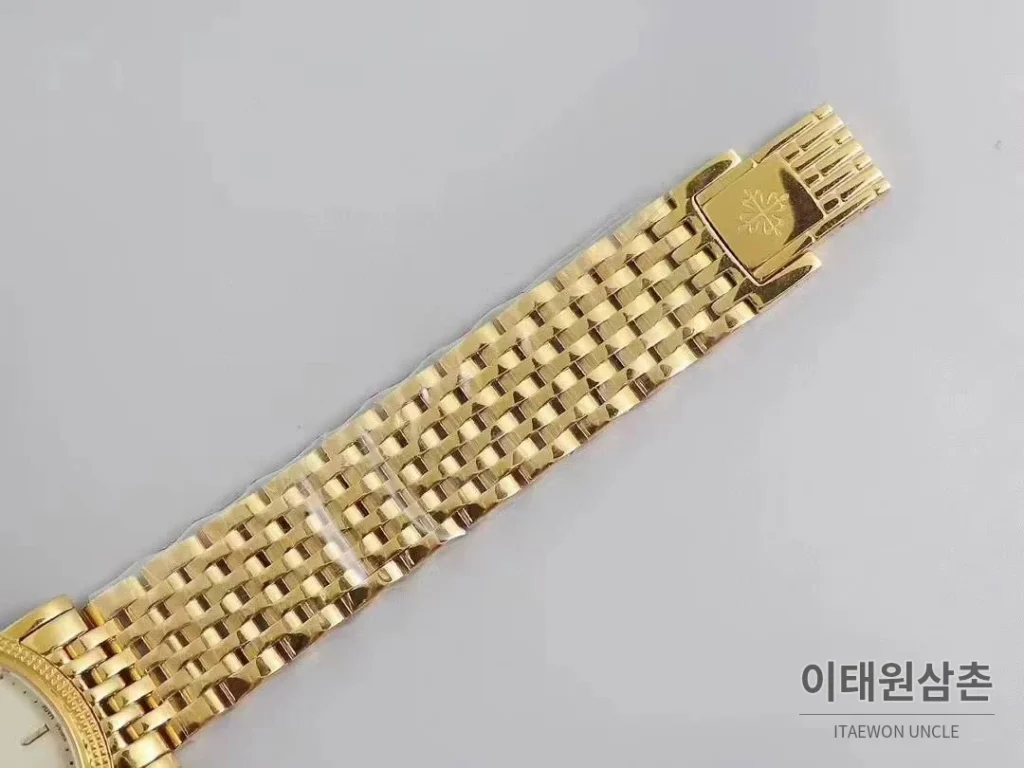파텍필립 칼라트라바 화이트다이얼 로만인덱스 울트라씬 오토매틱 38mm 골드 브레이슬릿 골드 베젤