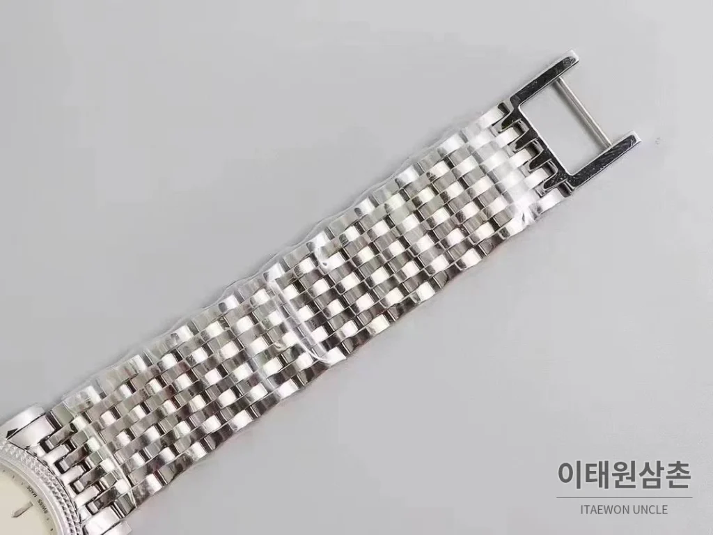 파텍필립 칼라트라바 화이트다이얼 로만인덱스 울트라씬 오토매틱 38mm 스틸 브레이슬릿