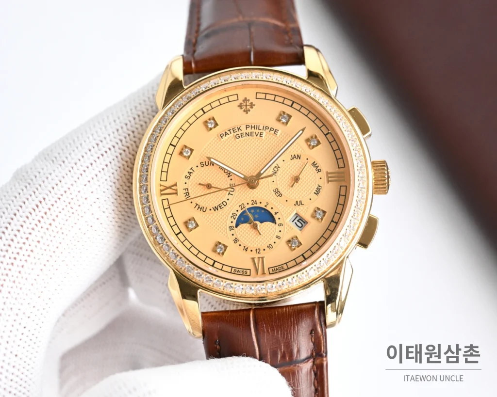 파텍필립 컴플리케이션 스틸 멀티캘린더 오토매틱 42mm 화이트 다이얼 블랙 가죽 스트랩 골드 베젤