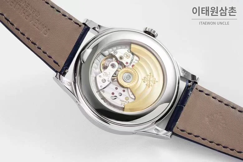파텍필립 컴플리케이션 화이트골드 그레이다이얼 애뉴얼캘린더 오토매틱 38mm 네이비 가죽 스트랩