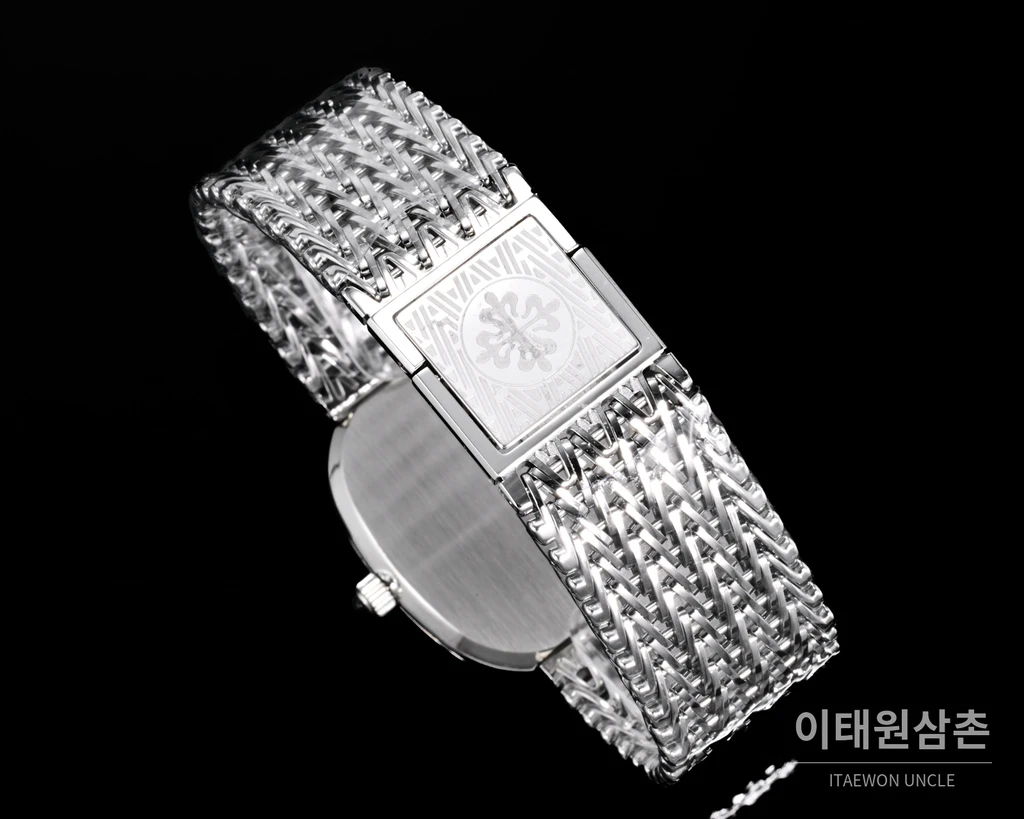 파텍필립 골든 엘립스 실버 톤 베젤 블루다이얼 오토매틱 39.5mm