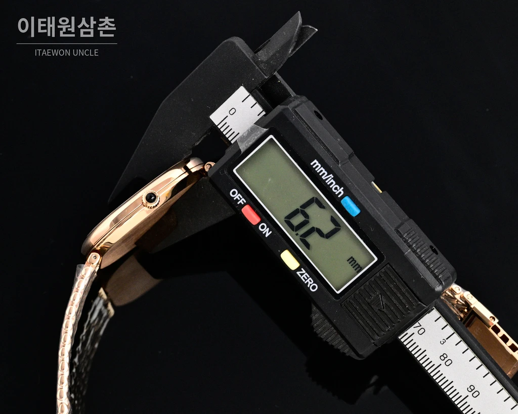 파텍필립 골든 엘립스 실버 톤 베젤 화이트다이얼 오토매틱 39.5mm