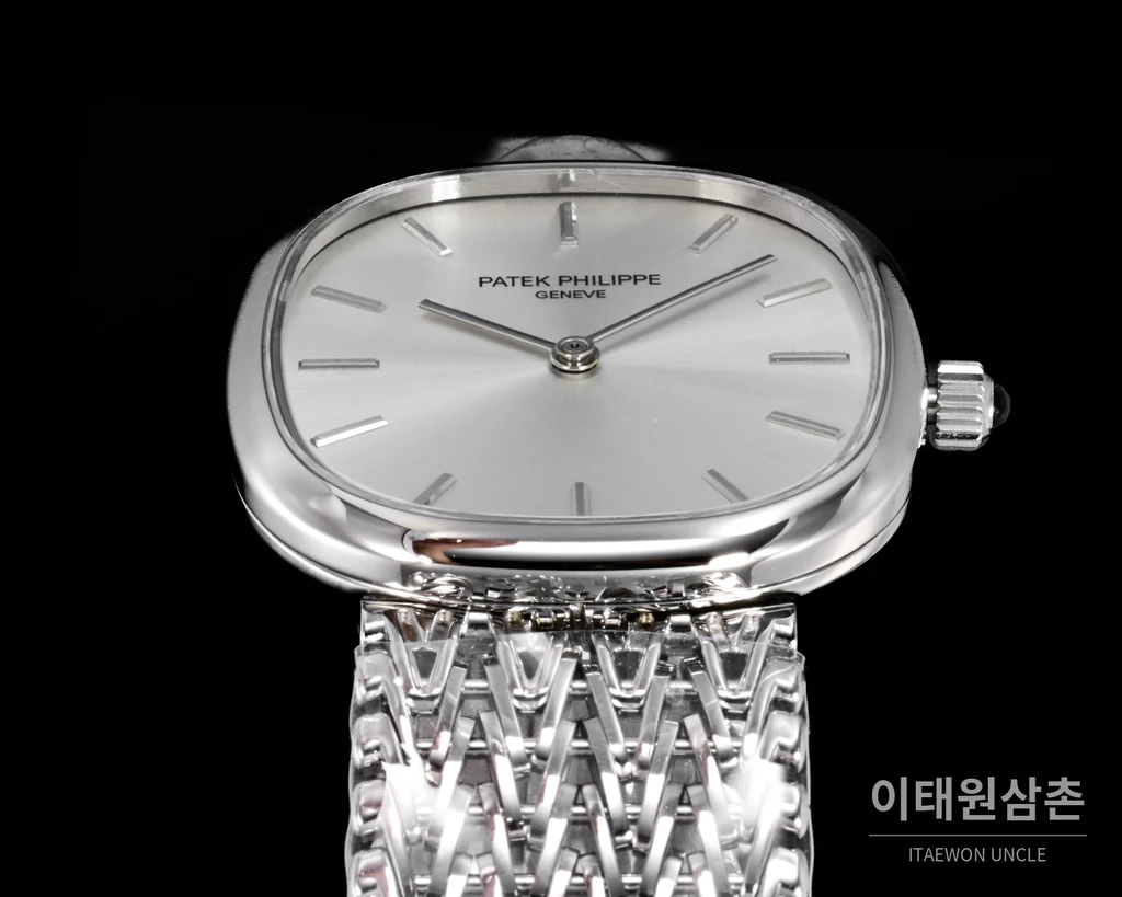 파텍필립 골든 엘립스 실버 톤 베젤 화이트다이얼 오토매틱 39.5mm