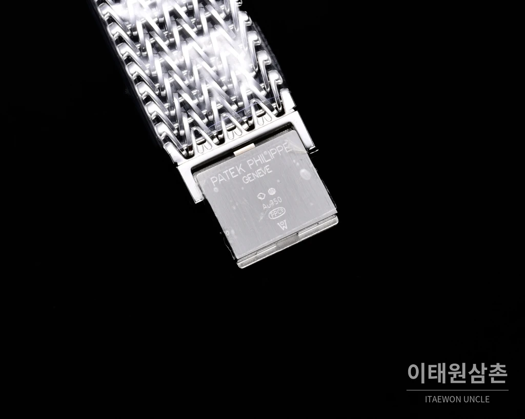 파텍필립 골든 엘립스 실버 톤 베젤 화이트다이얼 오토매틱 39.5mm