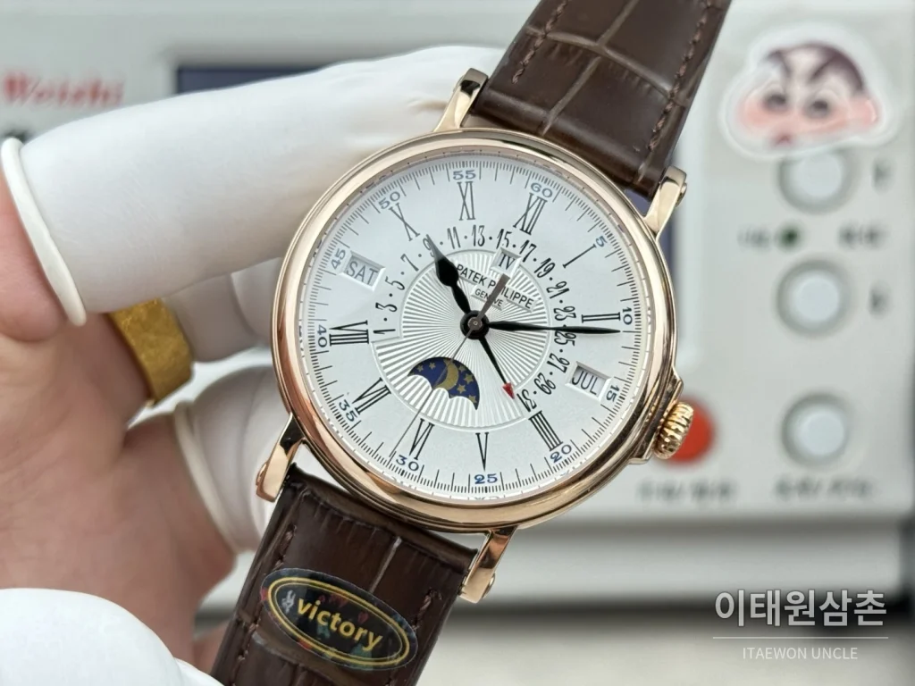 파텍필립 그랜드컴플리케이션 퍼페추얼캘린더 오토매틱 38mm 아이보리 화이트 다이얼 브라운 가죽 스트랩 로즈골드 베젤