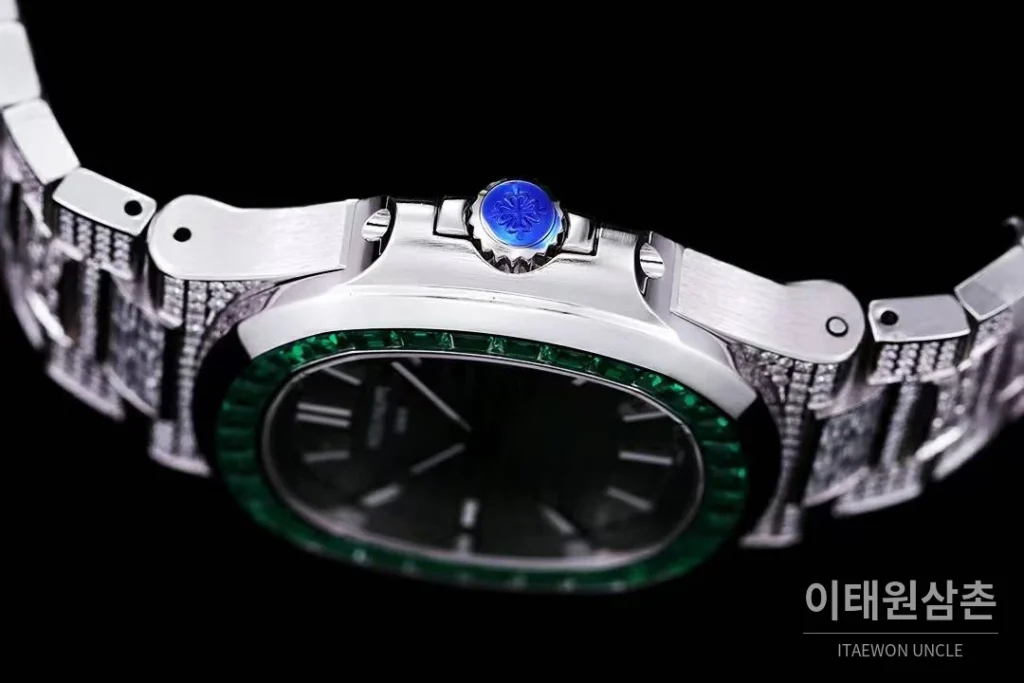 파텍필립 노틸러스 5711 풀다이아 파베 다이얼 오토매틱 40mm 실버 스틸 브레이슬릿 그린 베젤