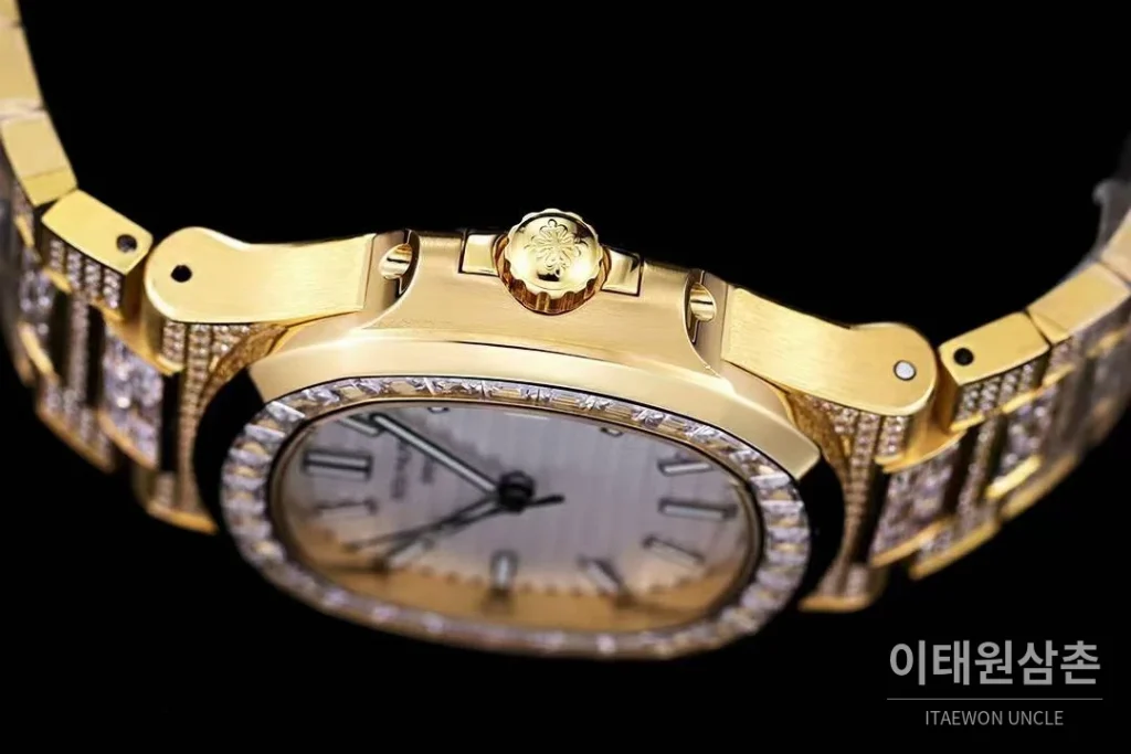 파텍필립 노틸러스 5711 풀다이아 파베 다이얼 오토매틱 40mm 실버 골드 브레이슬릿 골드 케이스