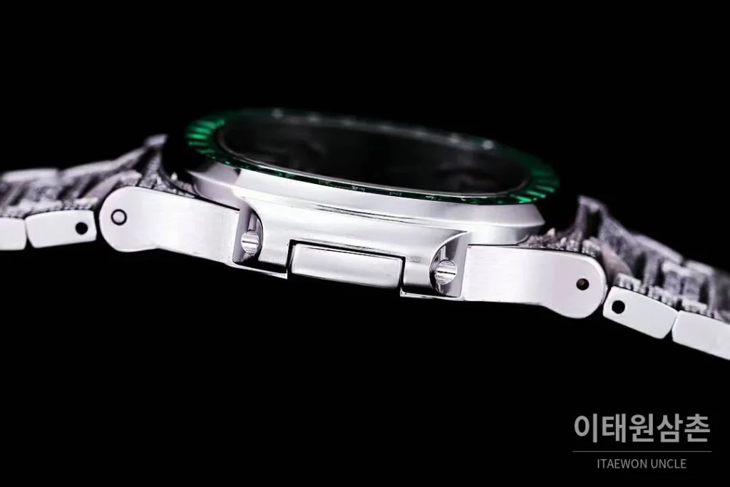 파텍필립 노틸러스 5711 풀다이아 파베 다이얼 오토매틱 40mm 실버 스틸 브레이슬릿 그린 베젤
