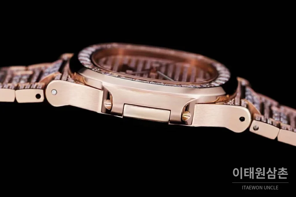 파텍필립 노틸러스 5711 풀다이아 파베 다이얼 오토매틱 40mm 실버 로즈골드 브레이슬릿 로즈골드 케이스