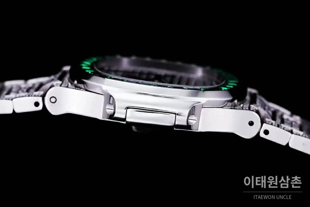 파텍필립 노틸러스 5711 풀다이아 파베 다이얼 오토매틱 40mm 실버 스틸 브레이슬릿 그린 베젤 (2)