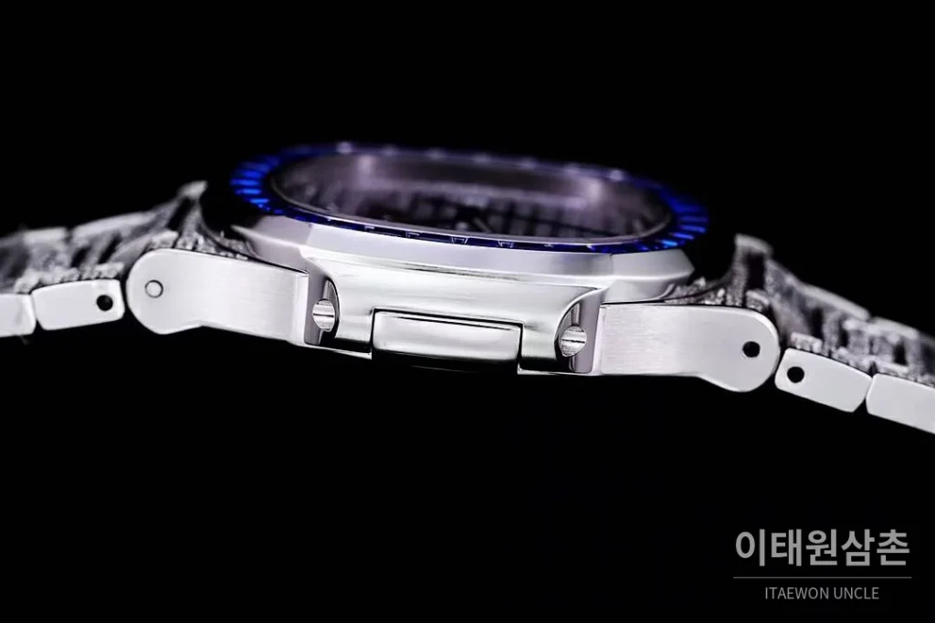 파텍필립 노틸러스 5711 풀다이아 파베 다이얼 오토매틱 40mm 실버 스틸 브레이슬릿 블루 베젤