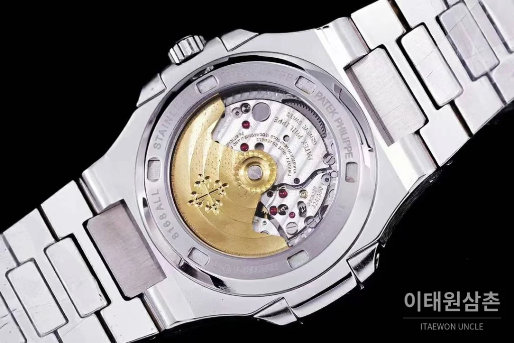 파텍필립 노틸러스 5711 풀다이아 파베 다이얼 오토매틱 40mm 실버 스틸 브레이슬릿 그린 베젤