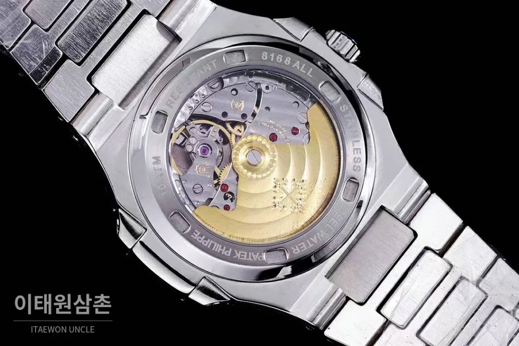 파텍필립 노틸러스 5711 풀다이아 파베 다이얼 오토매틱 40mm 실버 스틸 브레이슬릿 블루 베젤