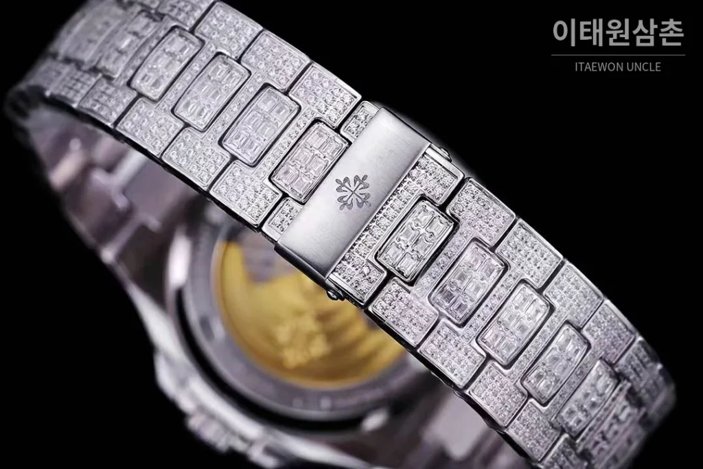 파텍필립 노틸러스 5711 풀다이아 파베 다이얼 오토매틱 40mm 실버 스틸 브레이슬릿 그린 베젤