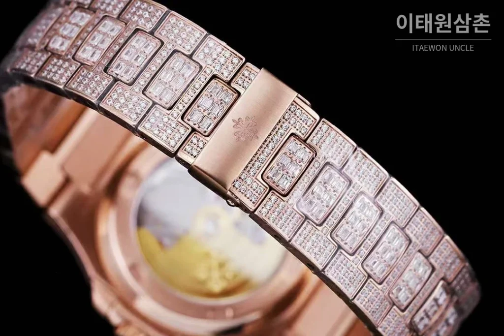 파텍필립 노틸러스 5711 풀다이아 파베 다이얼 오토매틱 40mm 실버 로즈골드 브레이슬릿 로즈골드 케이스