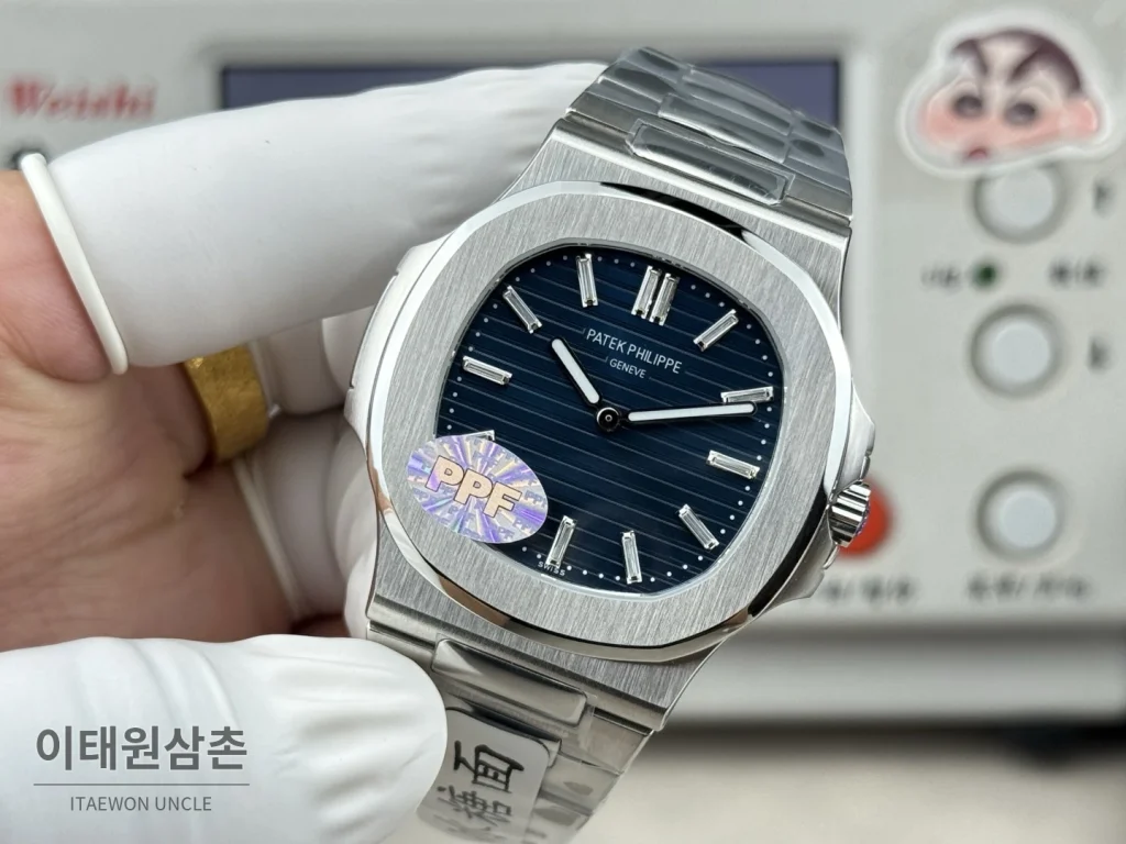 파텍필립 노틸러스 오토매틱 네이비 다이얼 스틸 브레이슬릿