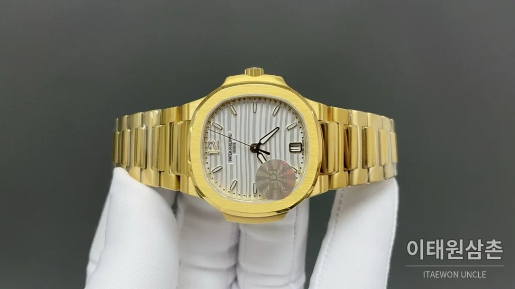파텍필립 노틸러스 오토매틱 35.2mm 화이트 다이얼 골드 브레이슬릿
