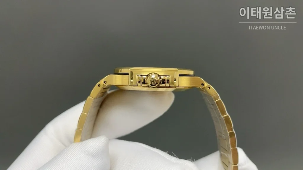 파텍필립 노틸러스 오토매틱 35.2mm 샴페인 다이얼 골드 브레이슬릿