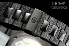 파텍필립 노틸러스 카본파이버 블랙다이얼 오토매틱 40mm 티타늄 브레이슬릿
