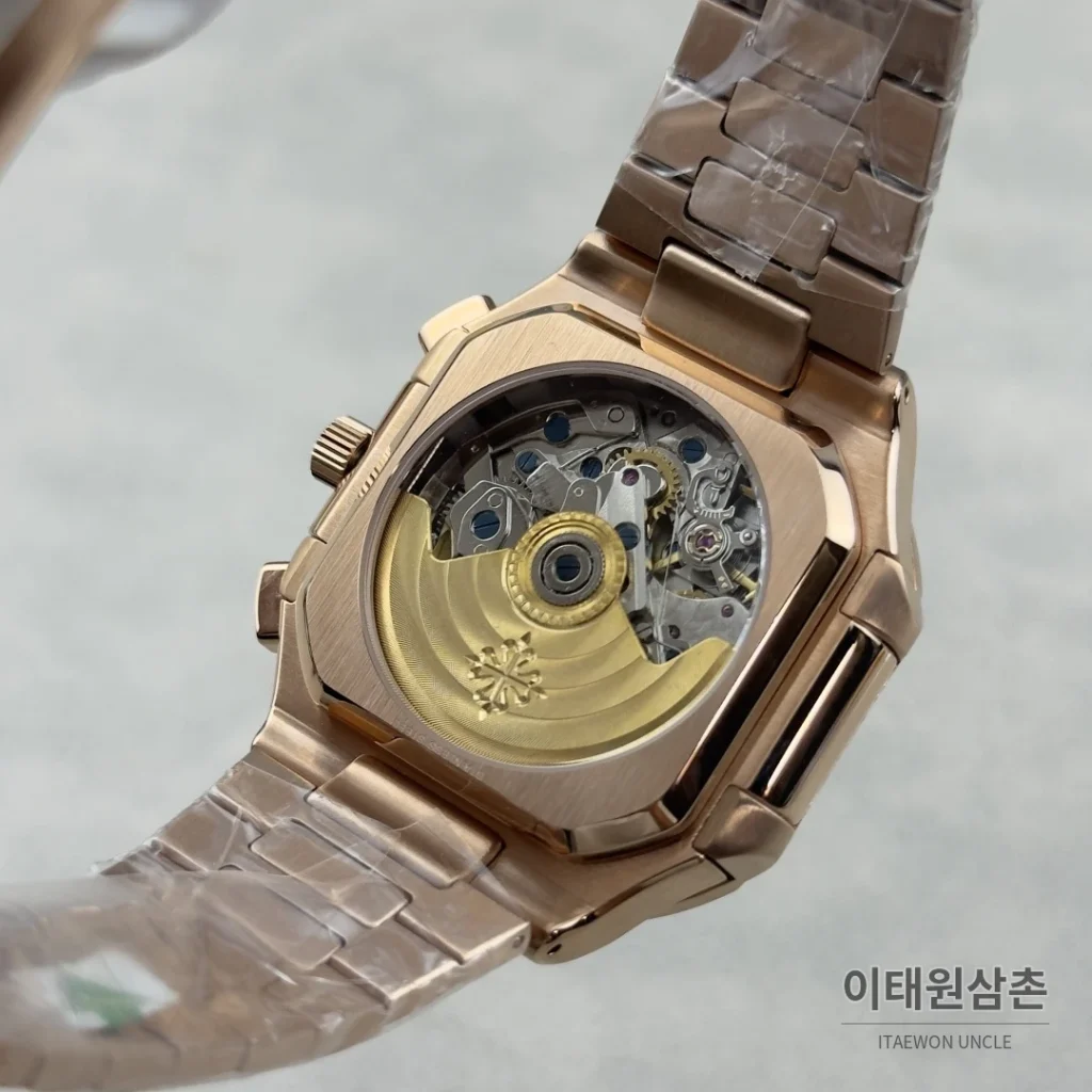 파텍필립 노틸러스 크로노그래프 오토매틱 44mm 네이비 다이얼 로즈골드 브레이슬릿