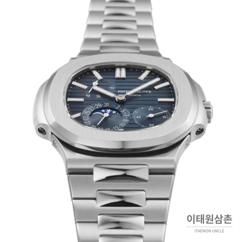 파텍필립 노틸러스 문페이즈 파워리저브 오토매틱 40mm 5712 네이비 다이얼