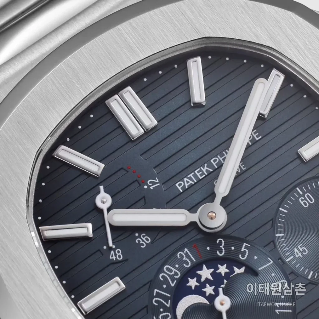 파텍필립 노틸러스 문페이즈 파워리저브 오토매틱 40mm 5712 네이비 다이얼