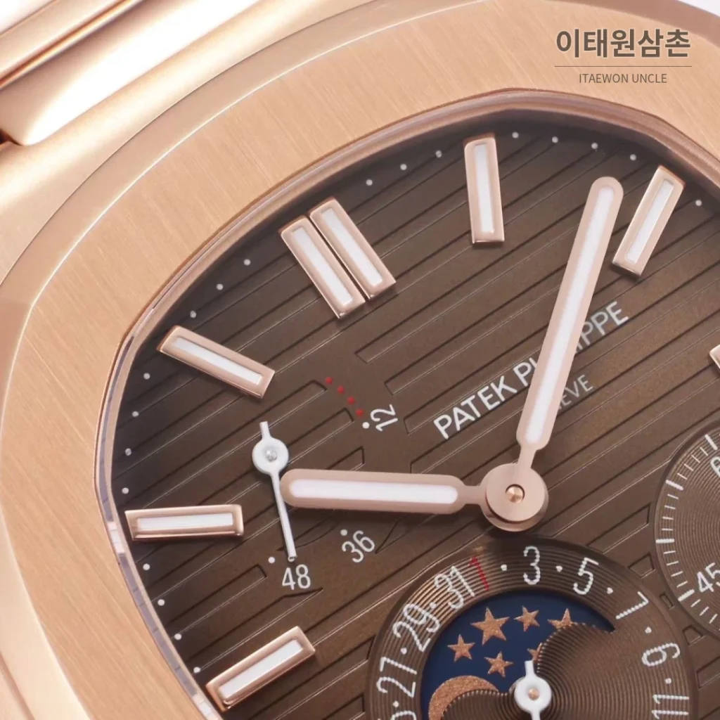 파텍필립 노틸러스 문페이즈 파워리저브 오토매틱 40mm 5712 브라운 다이얼