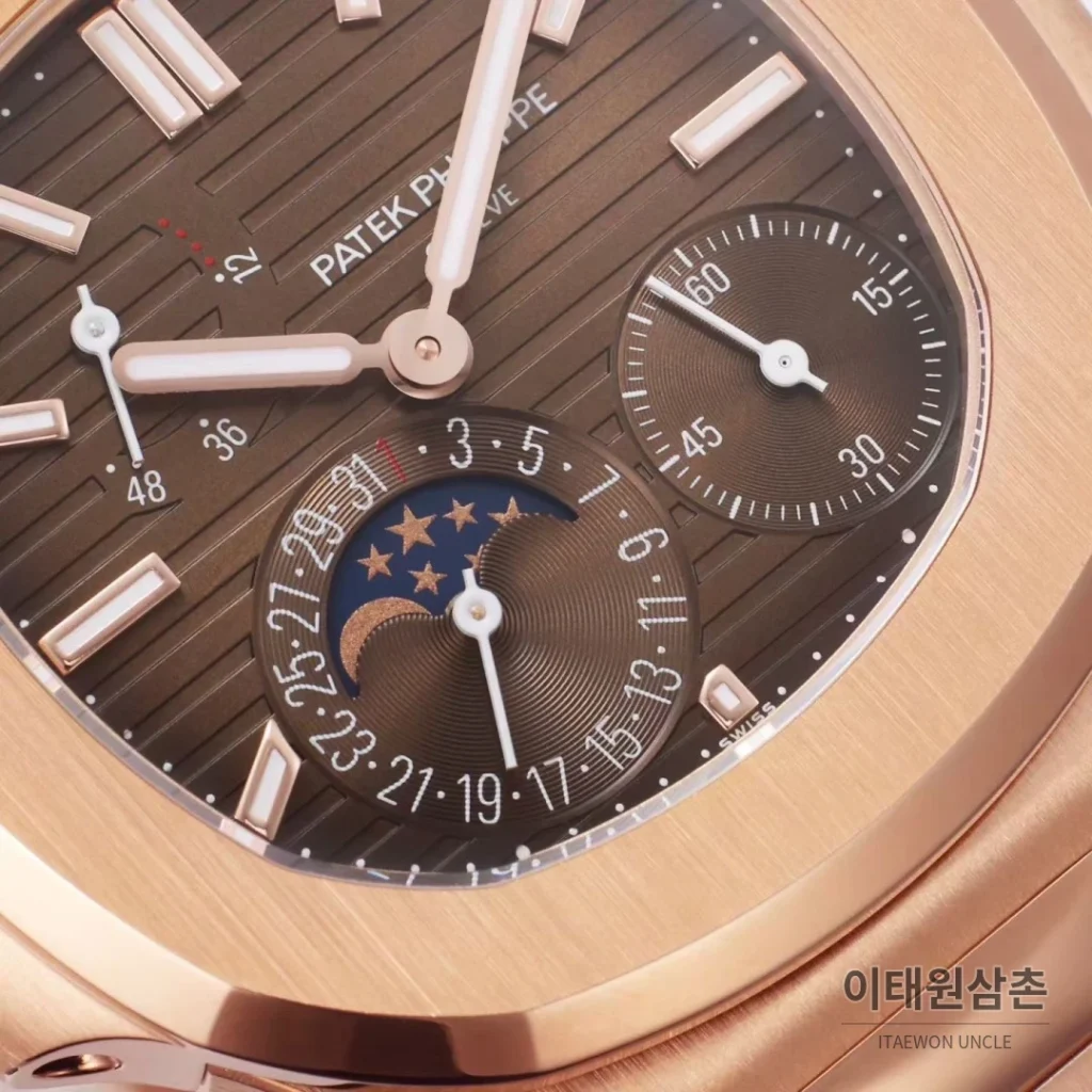 파텍필립 노틸러스 문페이즈 파워리저브 오토매틱 40mm 5712 브라운 다이얼