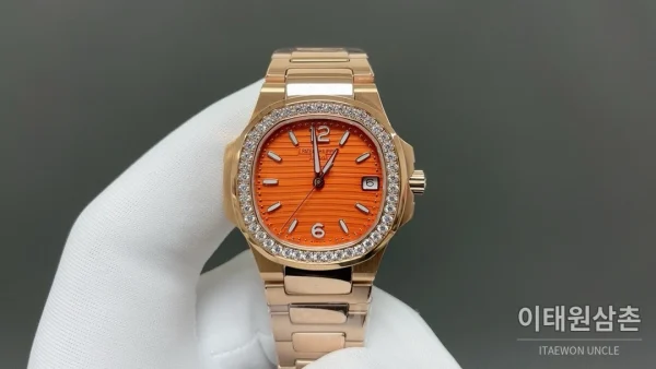 파텍필립 노틸러스 쿼츠 32mm 오렌지 다이얼 파텍필립 노틸러스 쿼츠 32mm 오렌지 다이얼