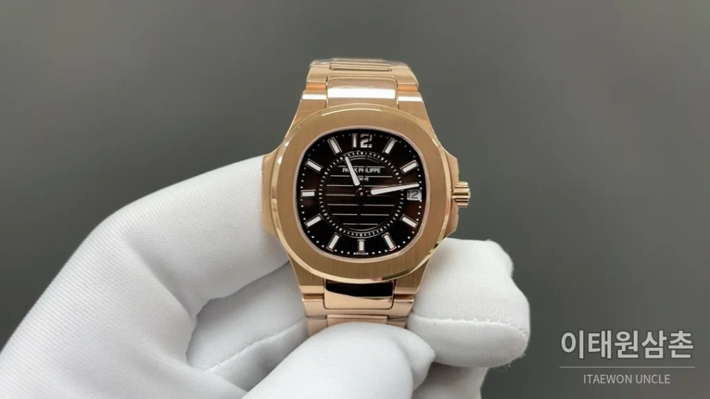 파텍필립 노utilus 쿼츠 32mm 화이트 다이얼