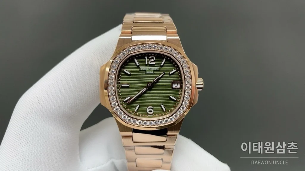 파텍필립 노틸러스 쿼츠 32mm 오렌지 다이얼