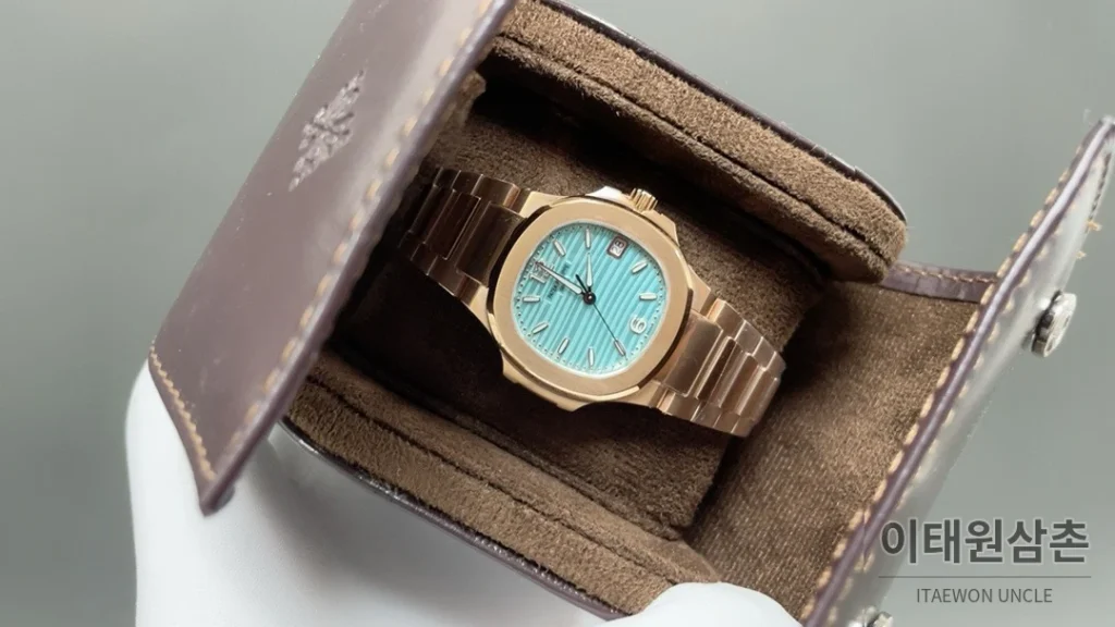 파텍필립 노utilus 쿼츠 32mm 화이트 다이얼