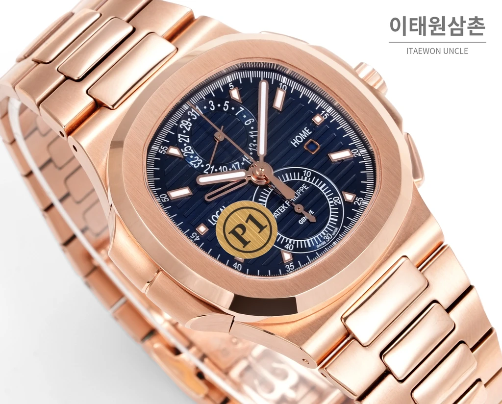 파텍필립 노틸러스 트래블타임 크로노그래프 스틸 브레이슬릿 오토매틱 40.5mm