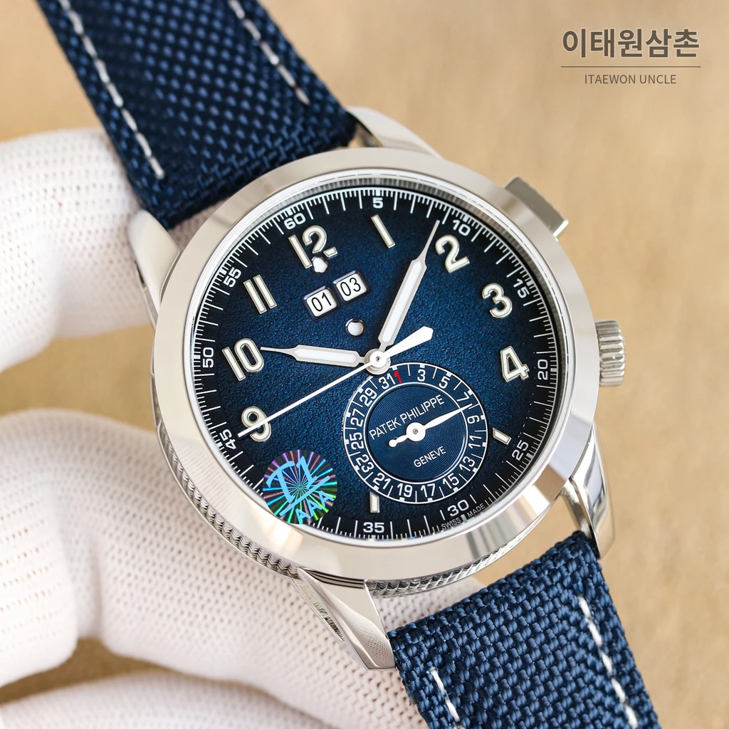 파텍필립 파일럿 트래블 타임 블루 다이얼 패브릭 스트랩 오토매틱 시계 41mm