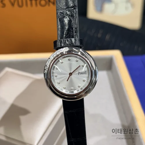 피아제 포제션 회전베젤 악어가죽 쿼츠 여성시계 골드