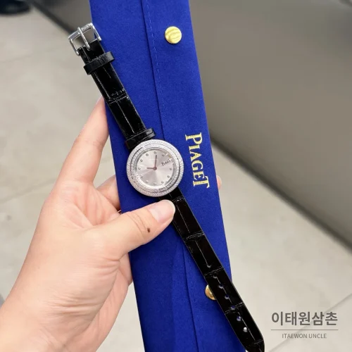 피아제 포제션 회전베젤 악어가죽 쿼츠 여성시계