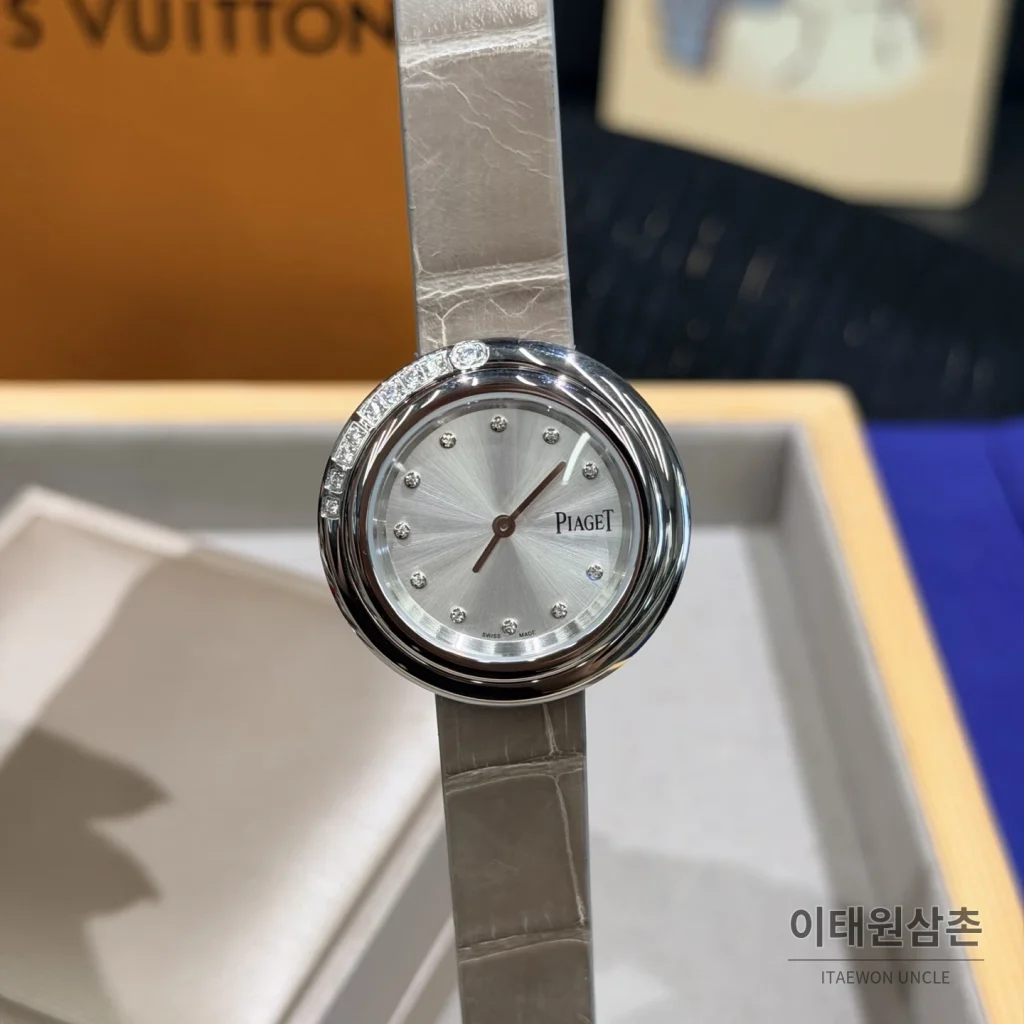 피아제 포제션 회전베젤 악어가죽 쿼츠 여성시계 골드