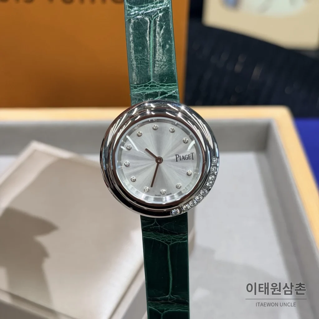피아제 포제션 회전베젤 악어가죽 쿼츠 여성시계 골드