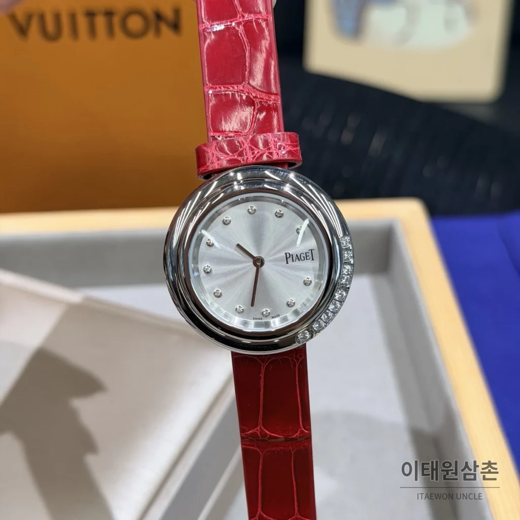 피아제 포제션 회전베젤 악어가죽 쿼츠 여성시계 골드