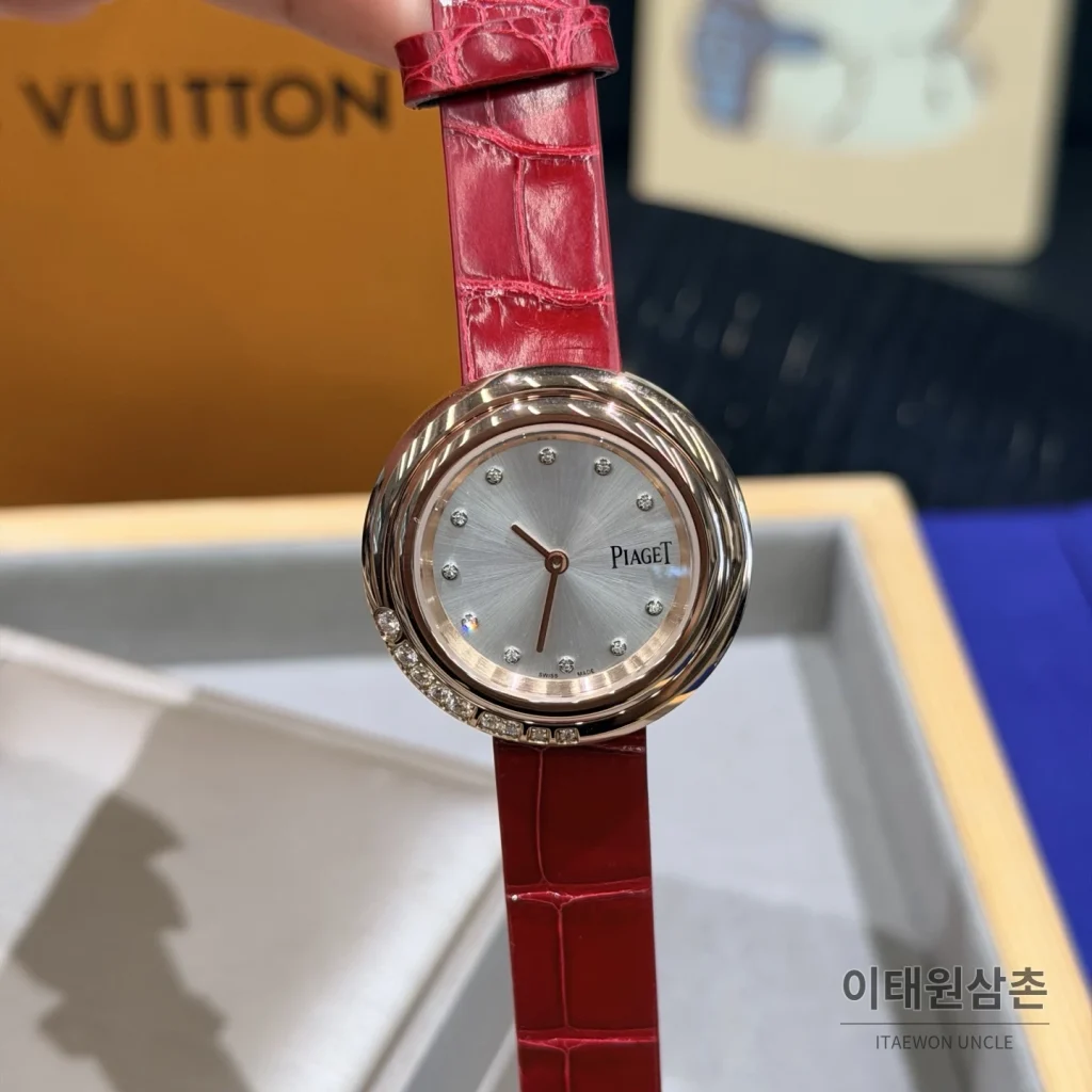 피아제 포제션 회전베젤 악어가죽 쿼츠 여성시계 골드