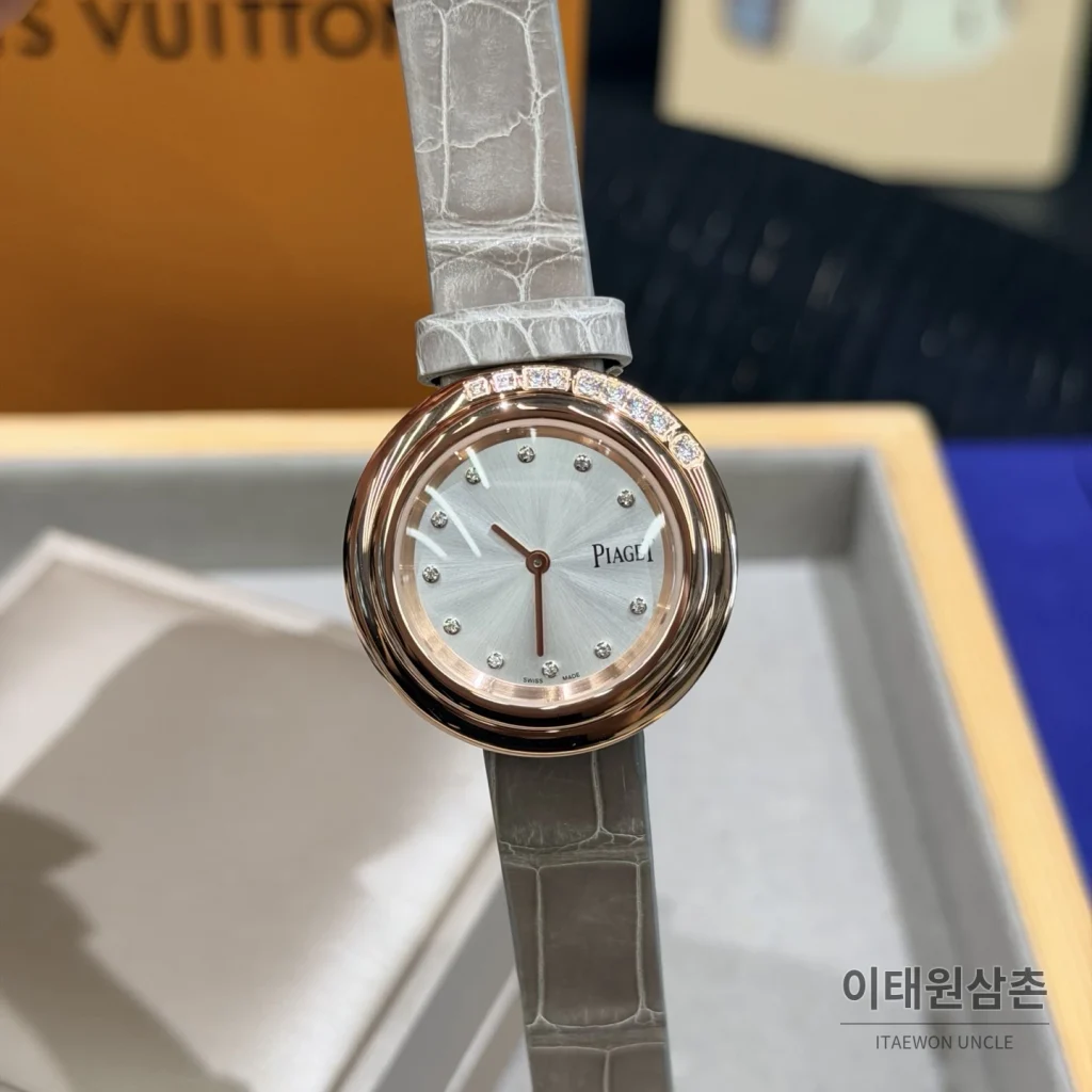 피아제 포제션 회전베젤 악어가죽 쿼츠 여성시계 골드
